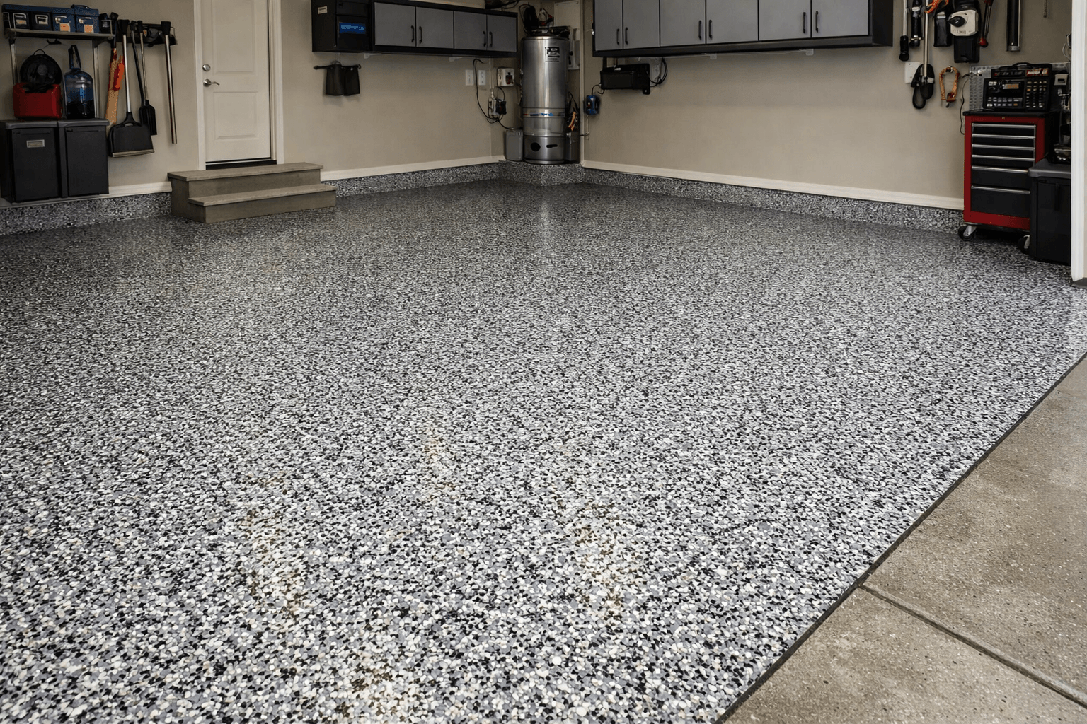 Epoxy garage floor Calgary — full flake chip broadcast system installed in 2-car garage